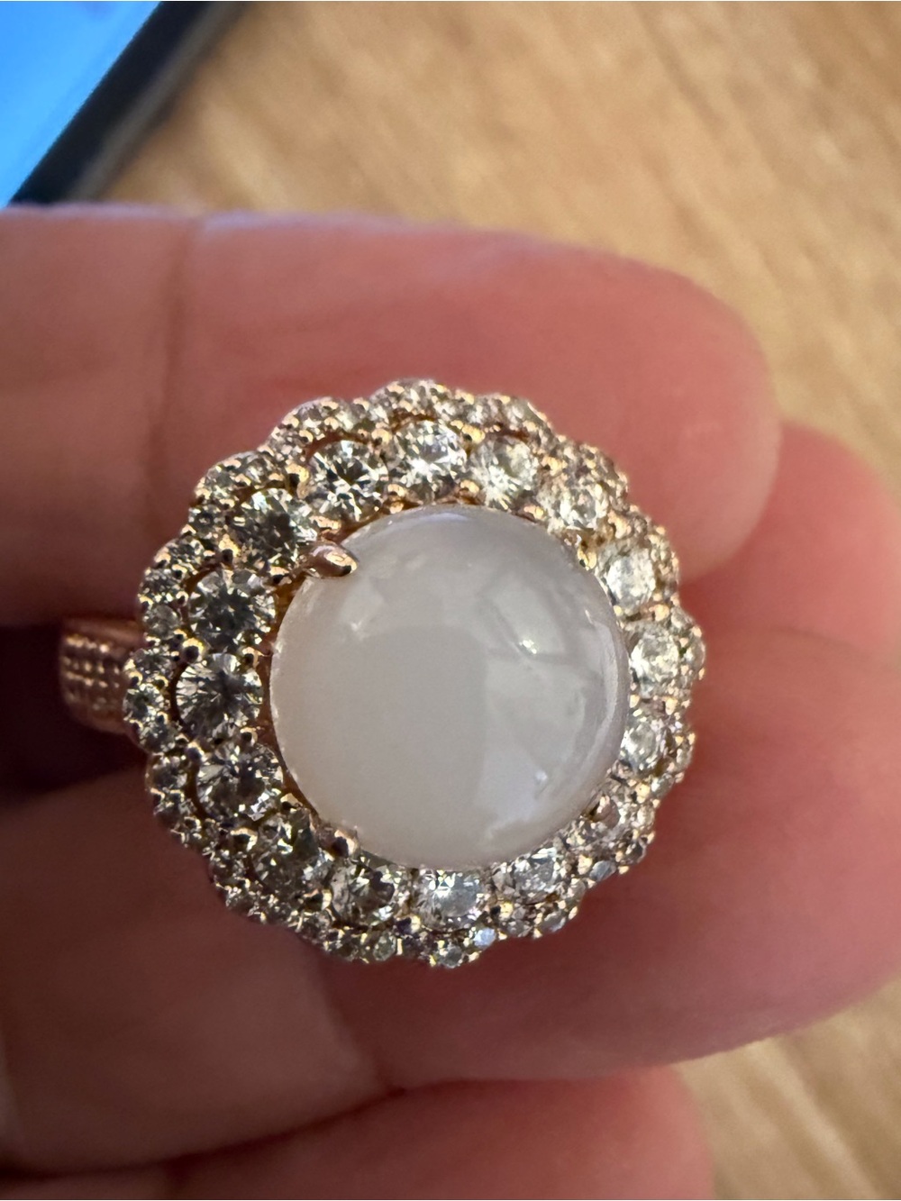 Elegant White Cabochon Halo Ring with Crystal Accents